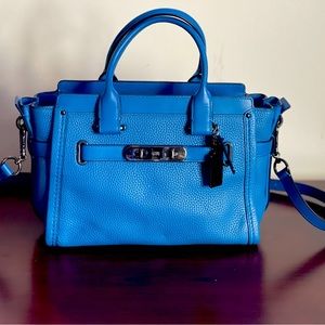 Original Coach woman’s handbag, blue color, high quality, size 27 ,  band new